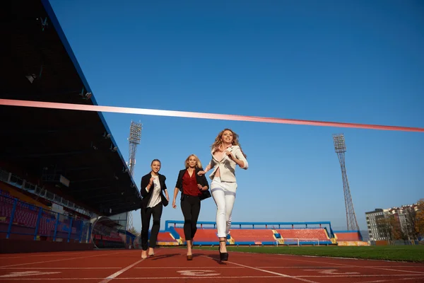 Mensen uit het bedrijfsleven wordt uitgevoerd op track racing — Stockfoto