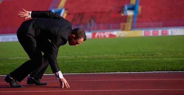 Empresário pronto para correr — Fotografia de Stock