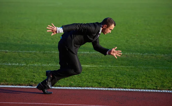 Businessman ready to sprint — Stock Photo, Image