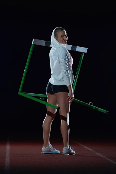 Žena sportovec s překážek — Stock fotografie