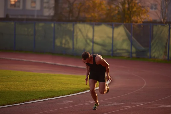 Athletic man sprinter — Stock Photo, Image