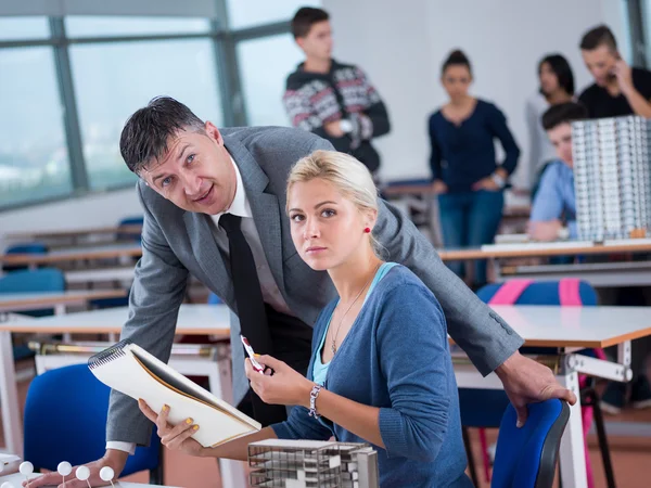Group of students with teacher in lab classroom — Stock Photo, Image