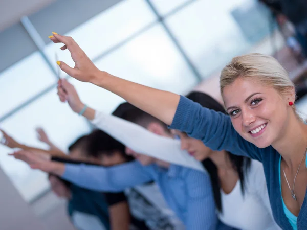 Group of Students raise their hands up — Stock Photo, Image