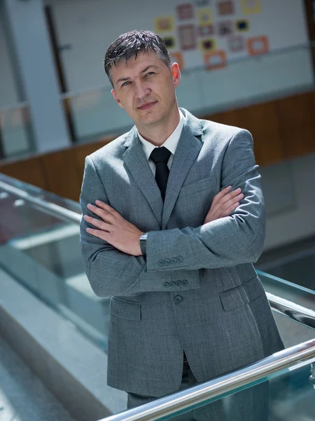 Businessman at modern office space indoors — Stock Photo, Image