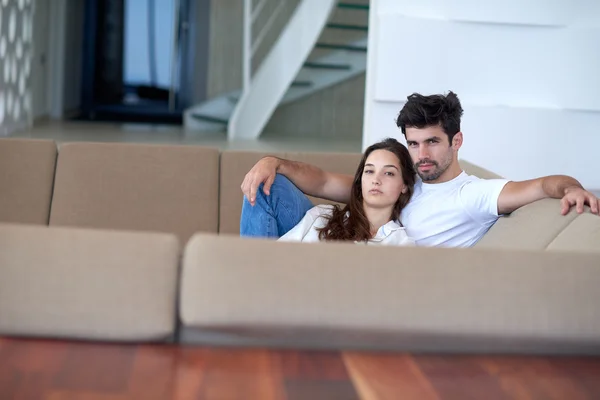 Relaxed young couple at home — Stock Photo, Image