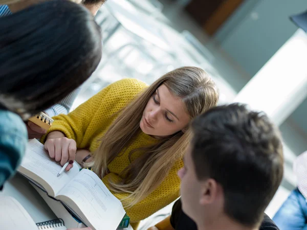 Group of students studying in classroom — Stock Photo, Image