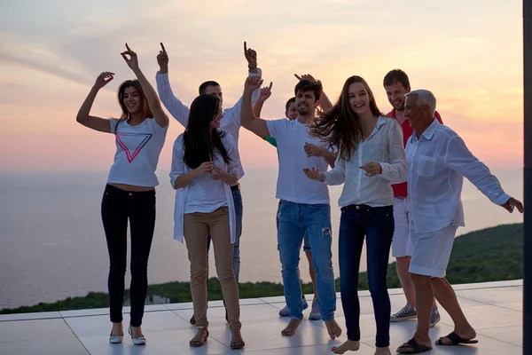 Party people on sunset — Stock Photo, Image