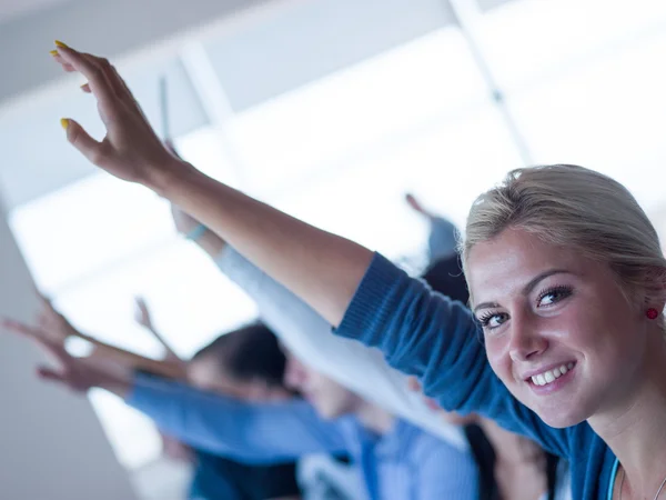 Students group raise hands up — Stock Photo, Image