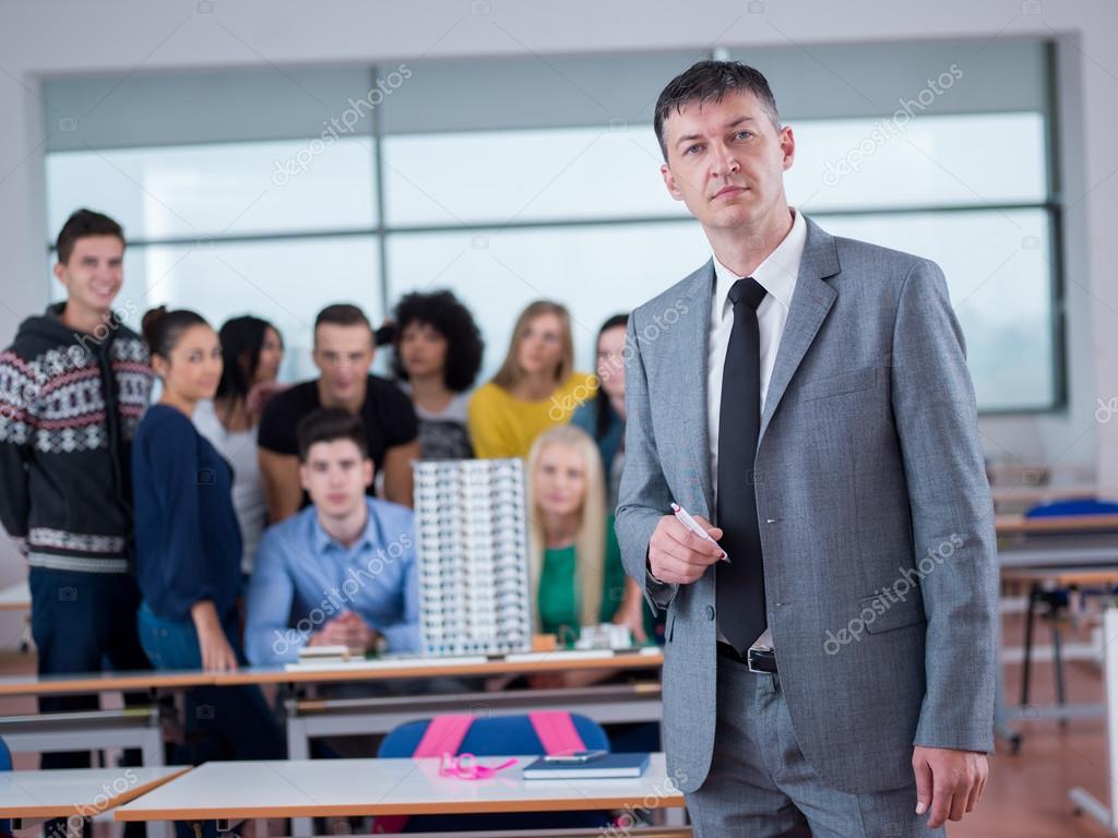 Students with teacher in computer lab classroom