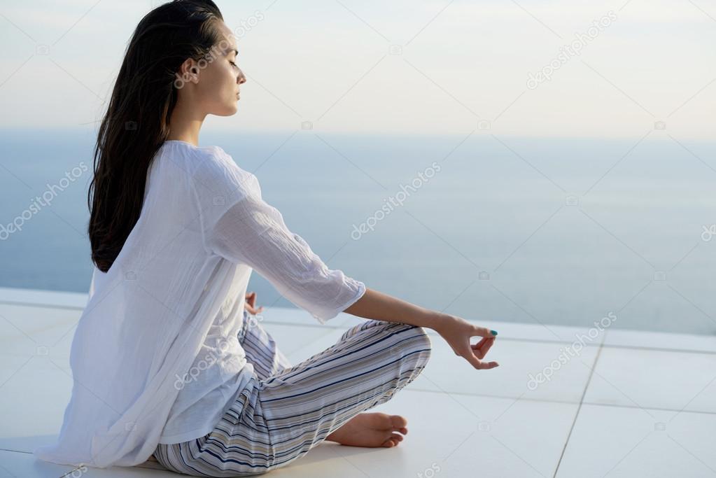 Young woman practicing yoga