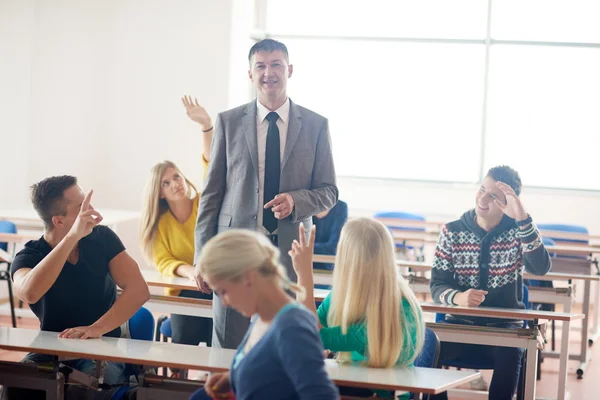 Group of students with teacher — Stock Photo, Image