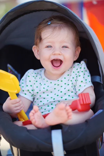 Portrait of baby in carriage — Stock Photo, Image