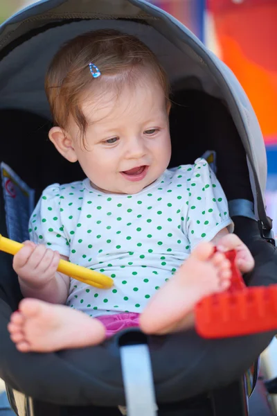 Portrait of baby in carriage — Stock Photo, Image