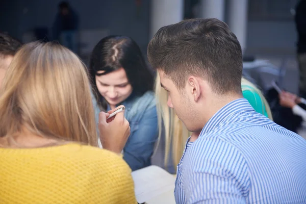 Students studying in classroom — Stock Photo, Image