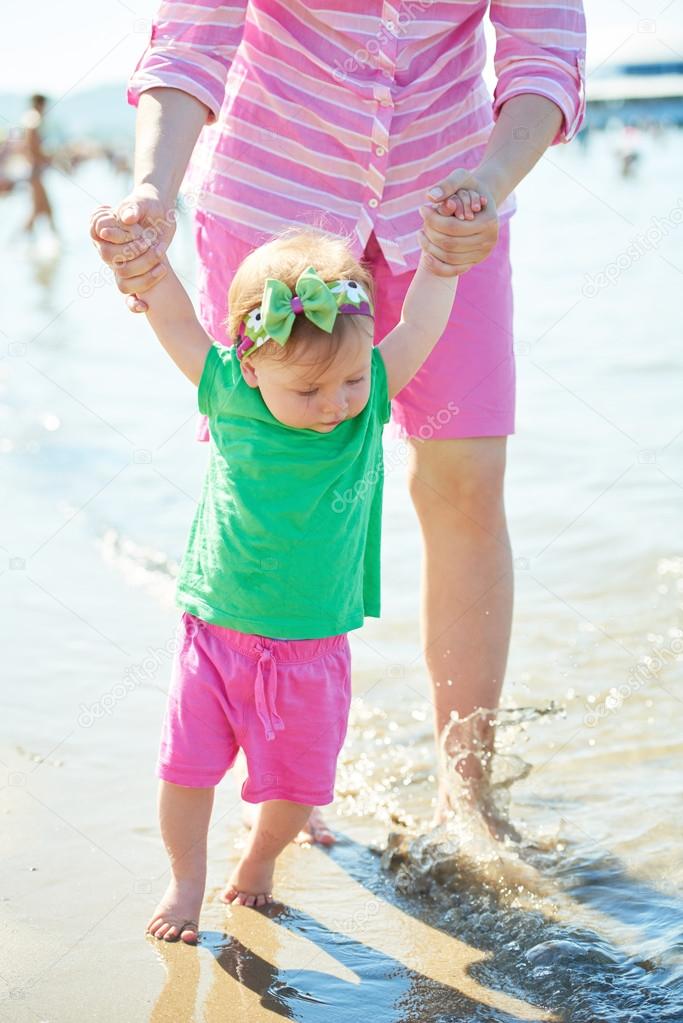 mom and baby on beach
