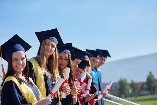 Young graduates students — Stock Photo, Image