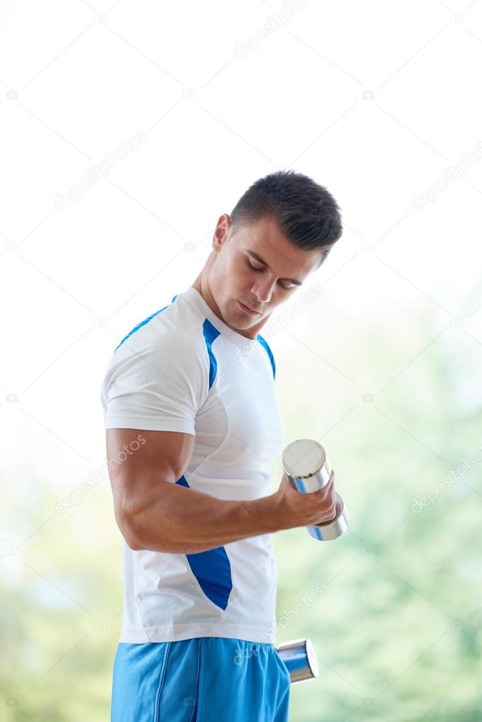 man exercising with weights