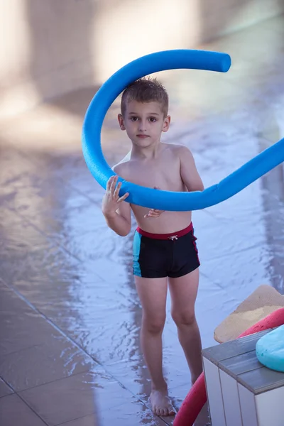 Child portrait in swimming pool — Stock Photo, Image