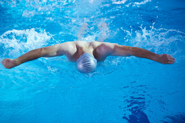 swimmer in indoor swimming pool