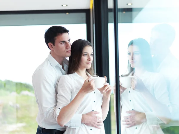 Couple drinking first morning coffee — Stock Photo, Image