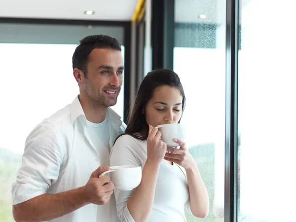 Couple drinking first morning coffee — Stock Photo, Image