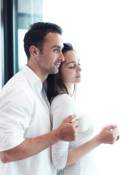 Couple drinking first morning coffee — Stock Photo, Image