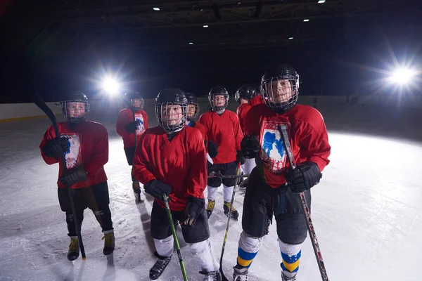 happy children gropu  hockey team sport players