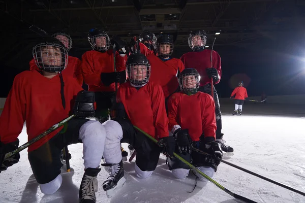 happy children gropu  hockey team sport players