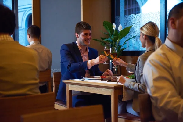 Business couple having dinner — Stock Photo, Image