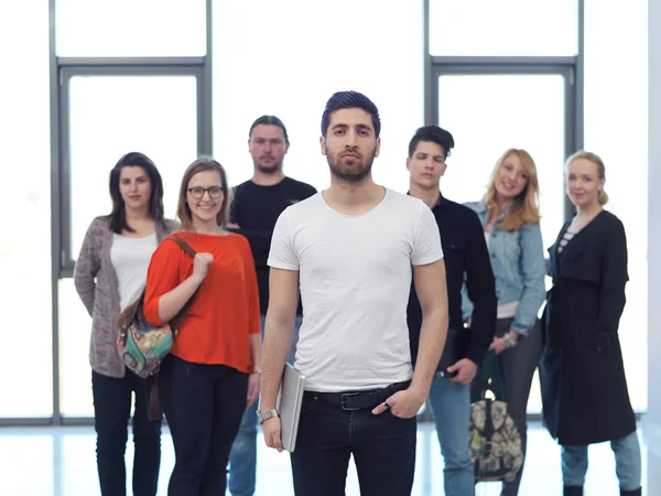 Students group standing together as team — Stock Photo, Image