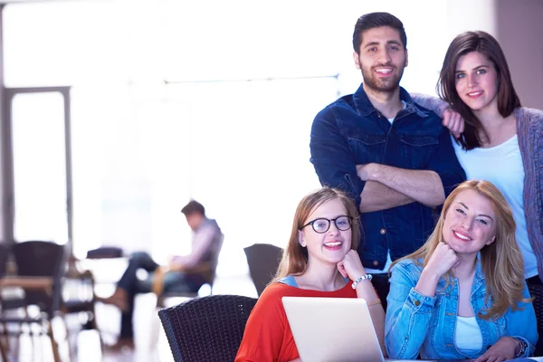 Students group standing together as team — Stock Photo, Image