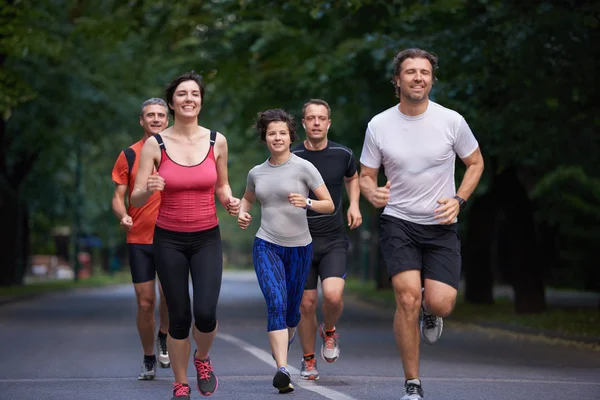 Skupina lidí jogging — Stock fotografie