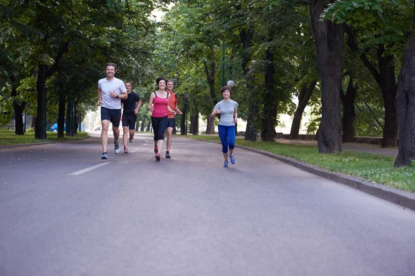 Pessoas grupo jogging — Fotografia de Stock