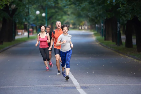 Skupina lidí jogging — Stock fotografie