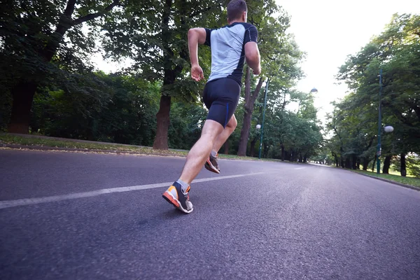 Gezonde atleet man joggen — Stockfoto