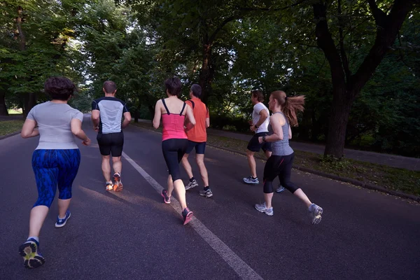 Människor grupp jogging — Stockfoto