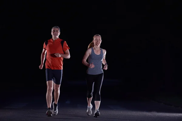 Jogging en couple tôt le matin — Photo