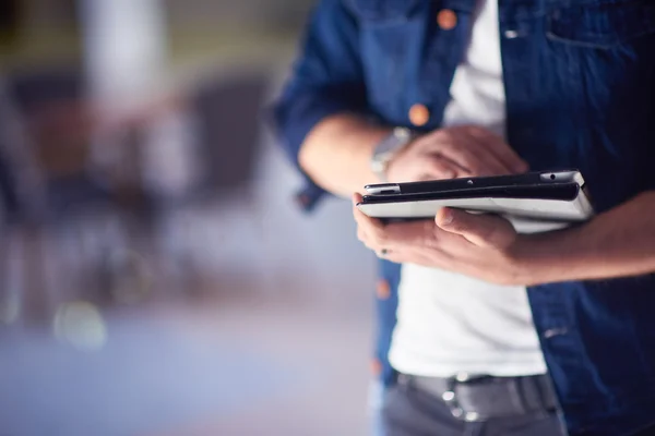 student using tablet computer