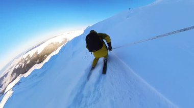 Experience the exhilaration of heliskiing with senior friends on an off-piste adventure. Carving through fresh, deep powder snow under a clear blue sky, this video captures the freedom and thrill of