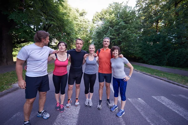 Människor grupp jogging — Stockfoto