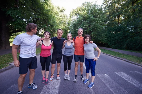 Pessoas grupo jogging — Fotografia de Stock