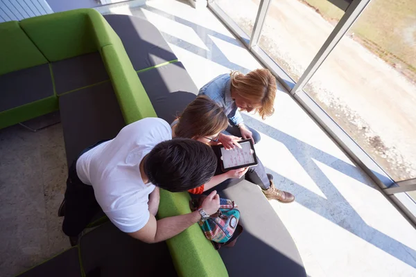 Students group working on school  project  together — Stock Photo, Image