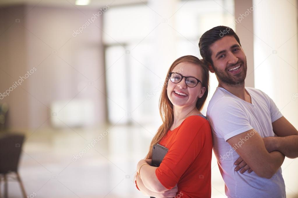 students couple standing together