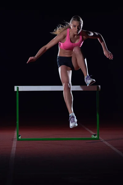 Leichtathletin und Hürden — Stockfoto