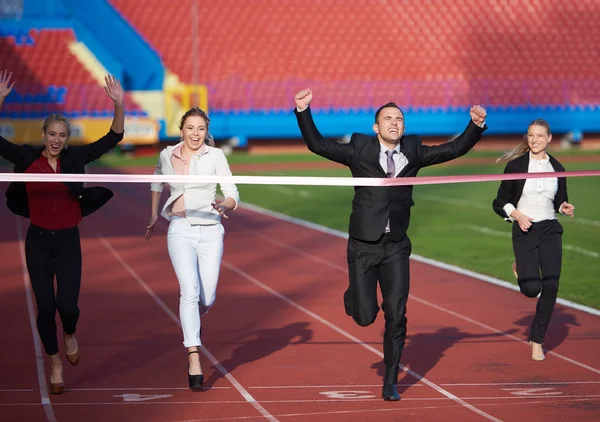 Gente de negocios corriendo en pista de carreras — Foto de Stock