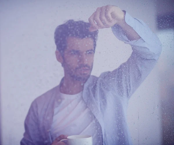 Man drinking first morning coffee — Stock Photo, Image