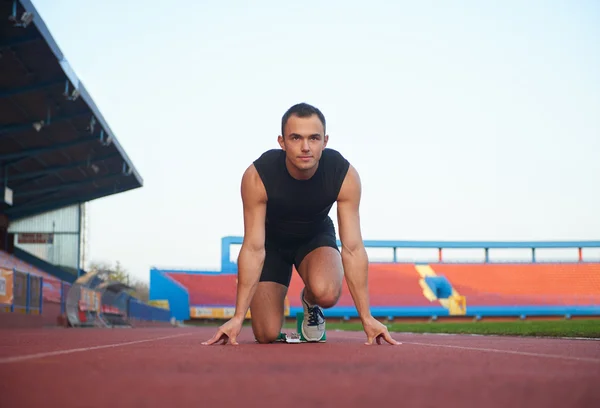 Pixelado diseño de la mujer sprinter dejando bloques de partida —  Fotos de Stock