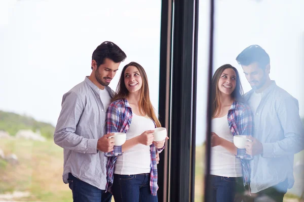 Relaxet young couple drink first morning coffee — Stock Photo, Image