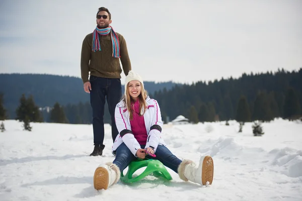 Happy young couple having fun on fresh show on winter vacation — Stock Photo, Image