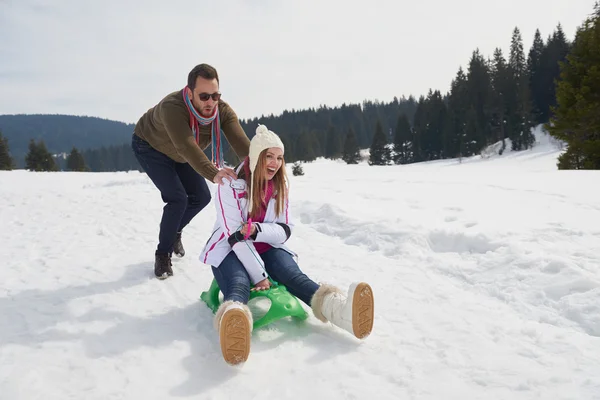 Couple having fun on fresh show — Stock Photo, Image